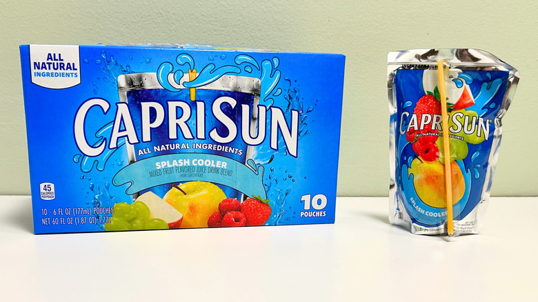 A box of Capri Sun Splash Cooler next to a pouch of Splash Cooler