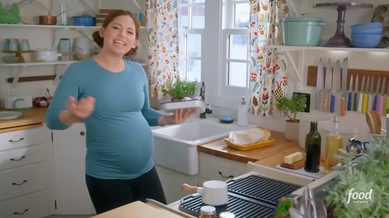 A still from "Girl Meets Farm," showing Molly Yeh in her kitchen