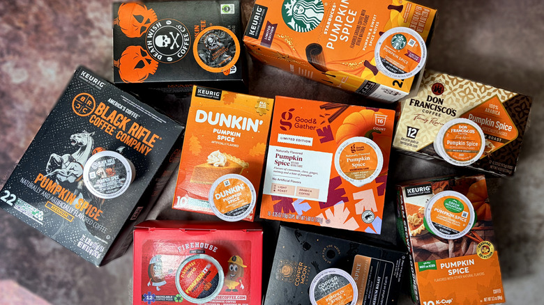 various packages and coffee pods arranged on table