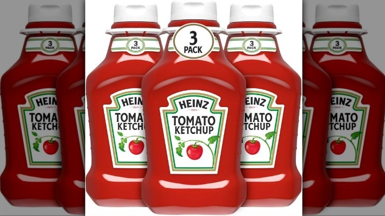 Heinz Ketchup three-pack on white background