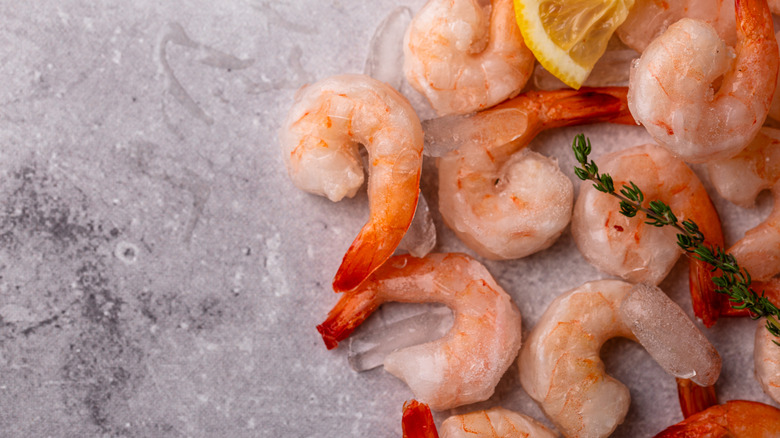 Cooked shrimp displayed on ice