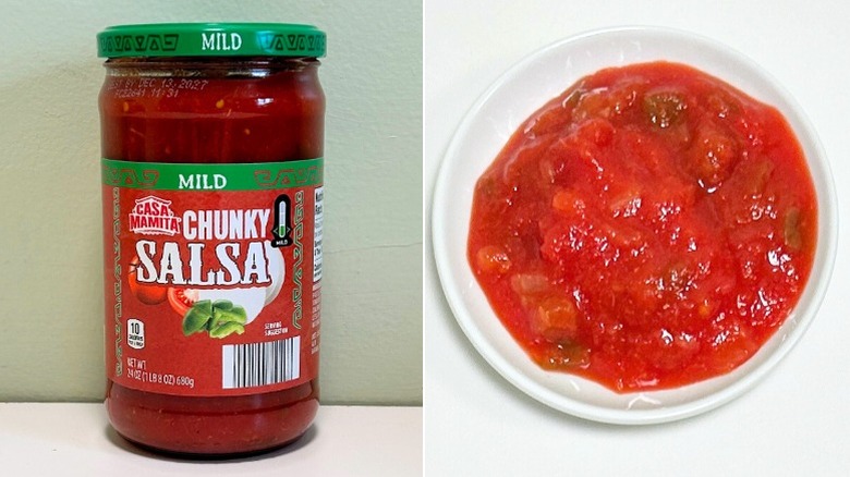A jar of Casa Mamita Chunky Salsa next to a white plate of salsa