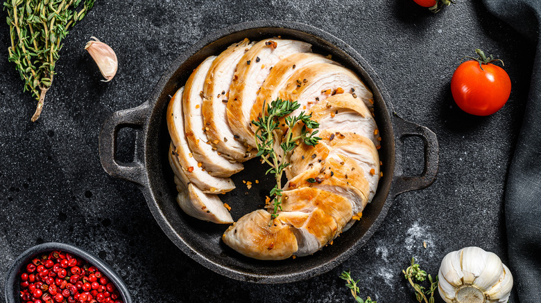 cooked turkey breast in pan