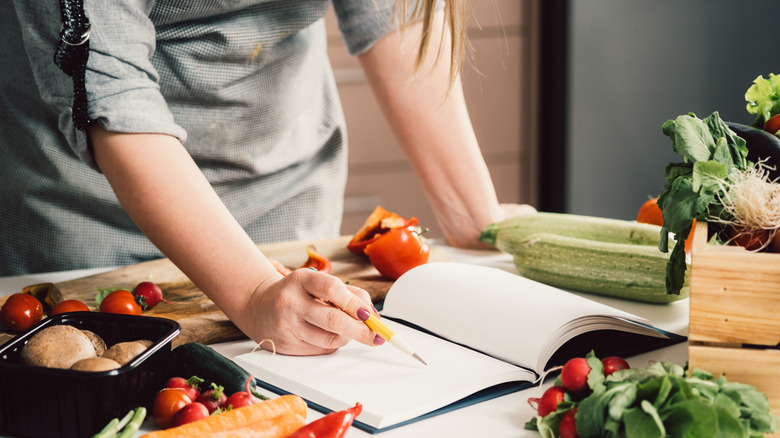flipping through a cookbook