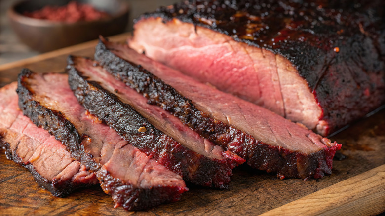 Sliced brisket on cutting board