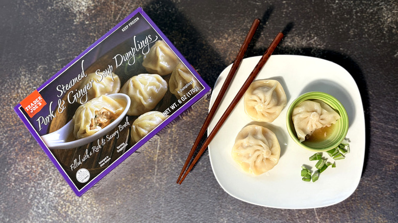 package and plate of pork soup douplings with chopsticks