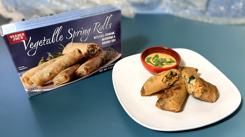 package and plate of vegetable spring rolls with and dipping sauce
