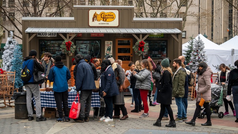 A line of people waiting to be served at a special Cracker Barrel location