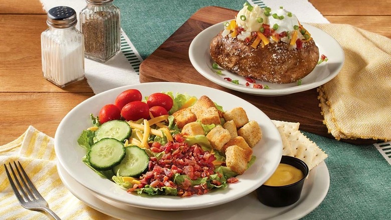 Cracker Barrel lunch meal with salad and baked potato