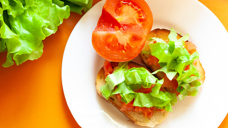 Sliced tomatoes and lettuce