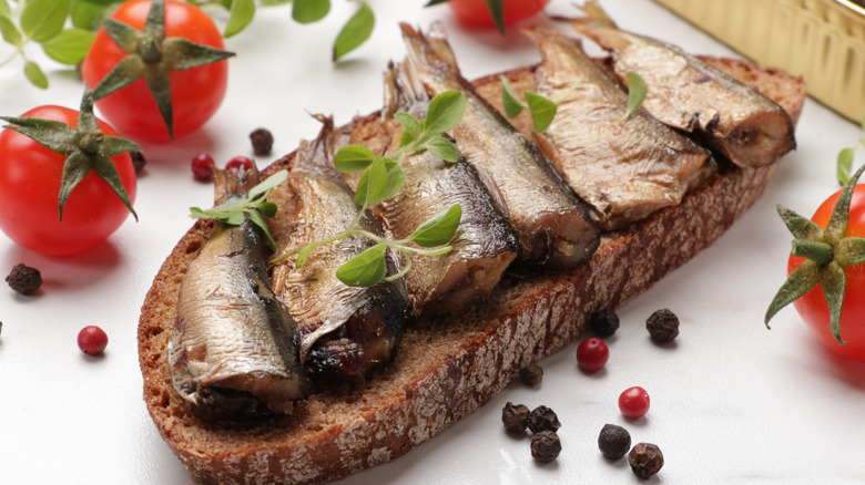 Canned sardines on bread slice