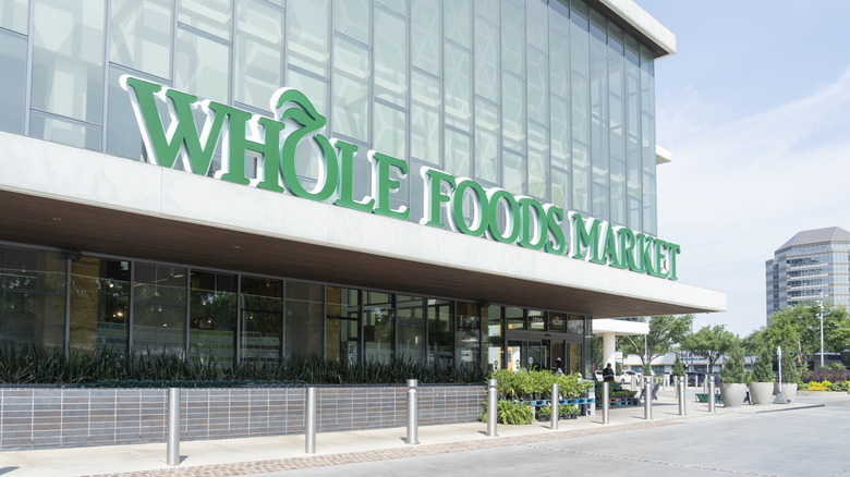 The outside of a Whole Foods Market from the parking lot