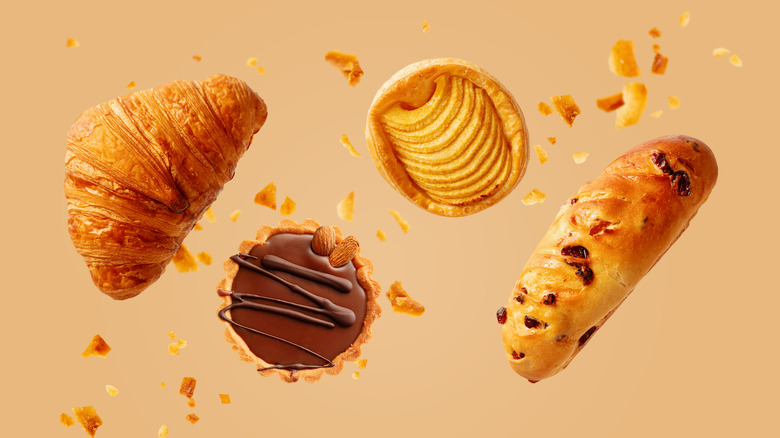 Four pastries tossed in air