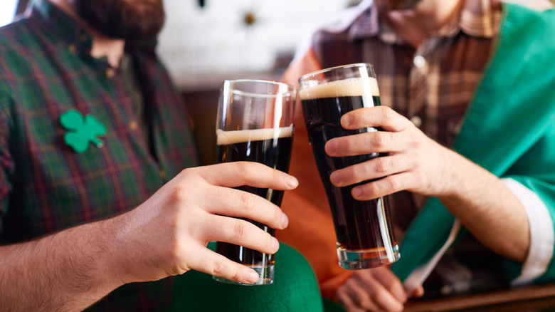 Two men drinking stout