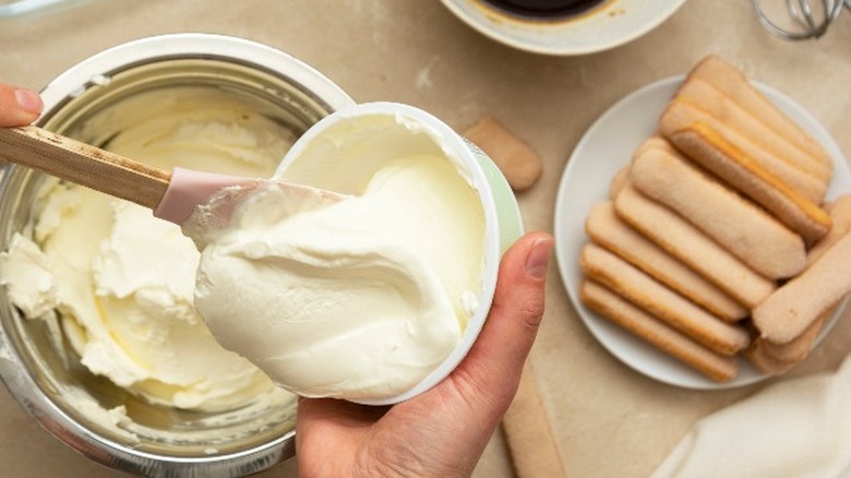 Mascarpone and savoiardi on table