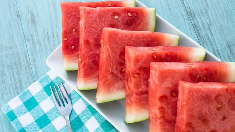 sliced watermelon on platter