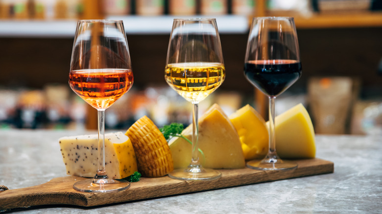 Three wine glasses with cheese