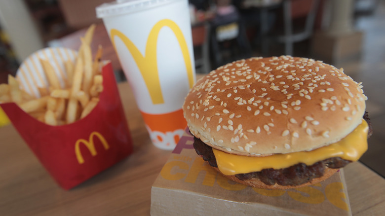 McDonald's cheeseburger fries and drink