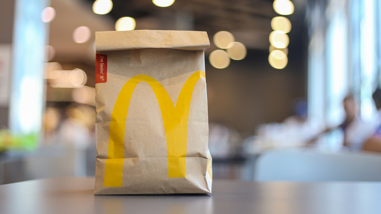 McDonald's paper bag on table