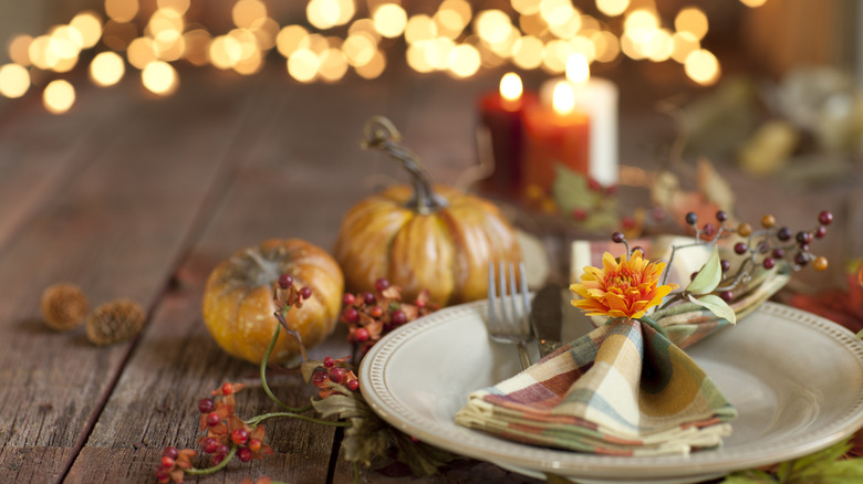 Thanksgiving place setting with pumpkins