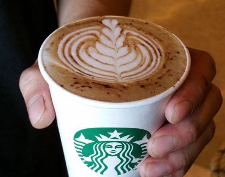 In post-Soviet Russia, Starbucks latte buy you. 