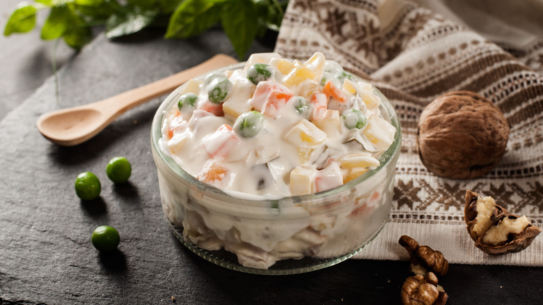 Dominican potato salad with peas and walnuts