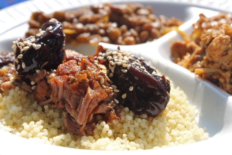 Lamb Tajine with Prunes over Cous Cous with Dijon Chicken. 