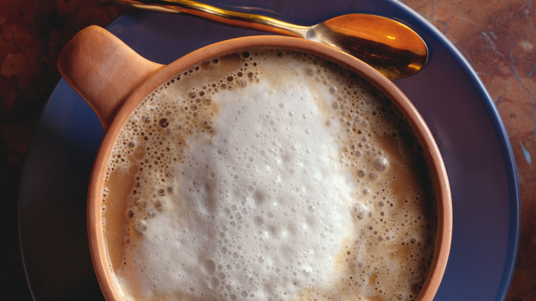 Frothy milk on coffee