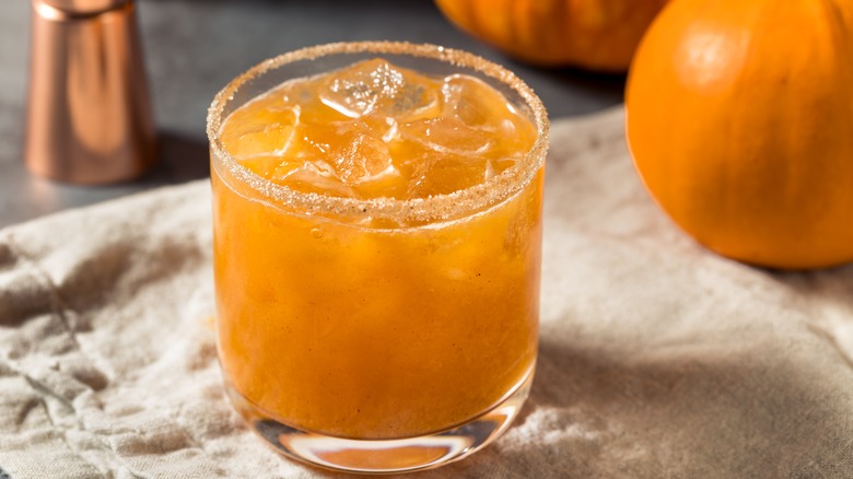 Pumpkin margarita on the rocks with spiced sugar rim