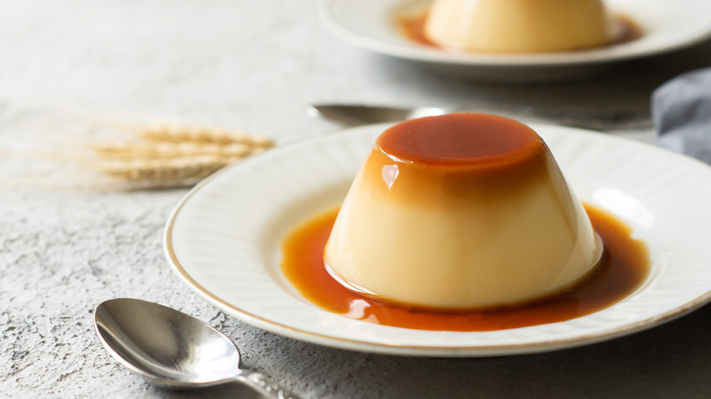 Flan on a plate with spoon