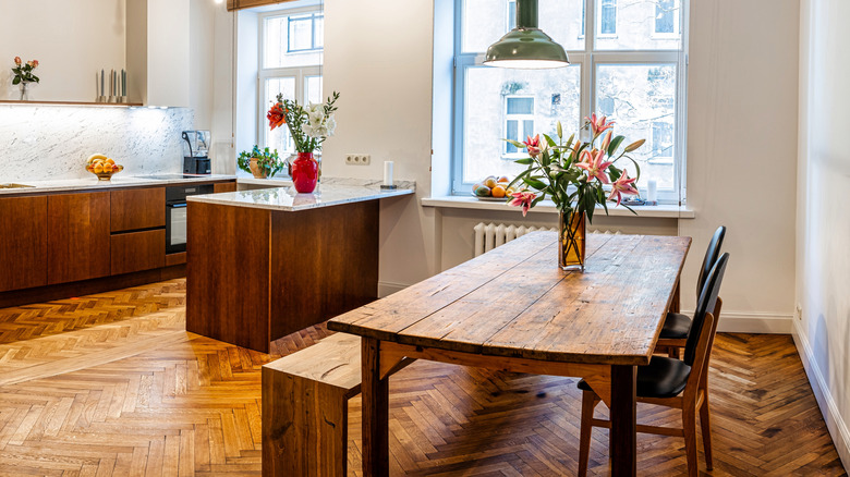 Kitchen with wooden herringbone flooring
