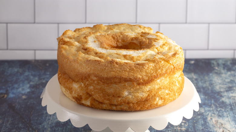 Angel food cake on a white cake stand