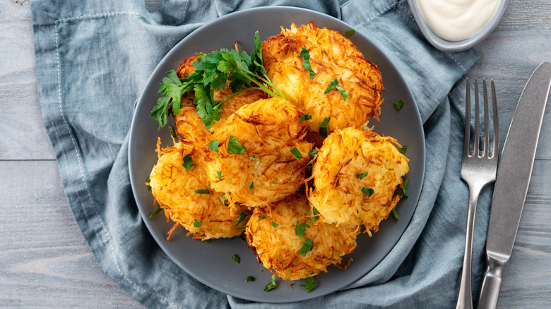 Plate of latkes with fresh parsley