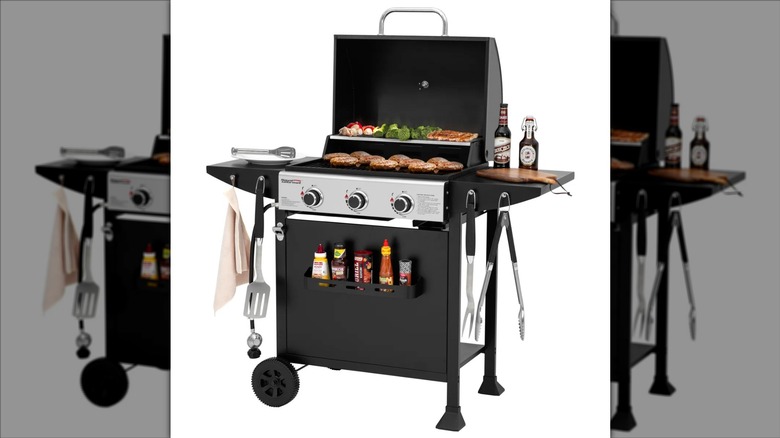 Burgers and veggies cooking on a Royal Gourmet 3-burner gas grill