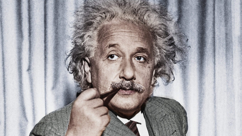 Colorized photo of Albert Einstein smoking pipe