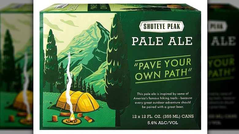6-pack of Shuteye Peak Pale Ale in its packaging with a photo of a tent in the forest