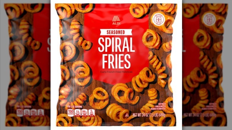 Seasoned spiral fries on white background