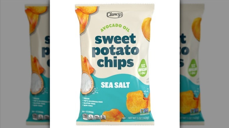 Sea salt sweet potato chips on white background
