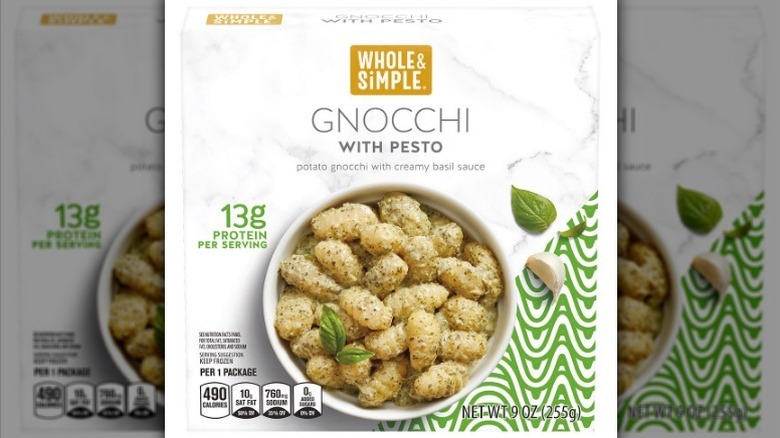 Gnocchi pesto on white background