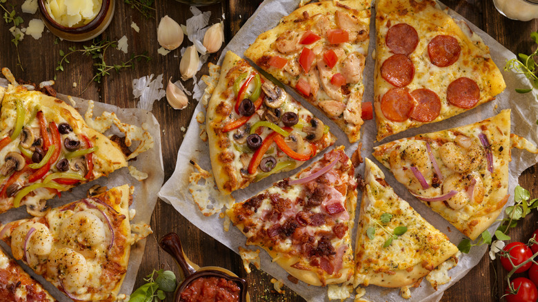 overhead shot of various types of pizza slices
