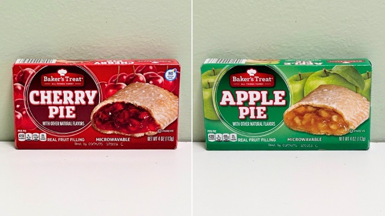 Side-by-side of two Baker's Treat lunchbox pies, one cherry and one apple.