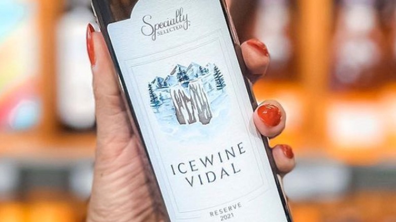 hand holding bottle of ice wine vidal reserve 2021