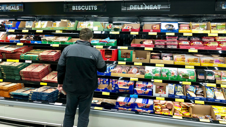 Person shopping in an Aldi
