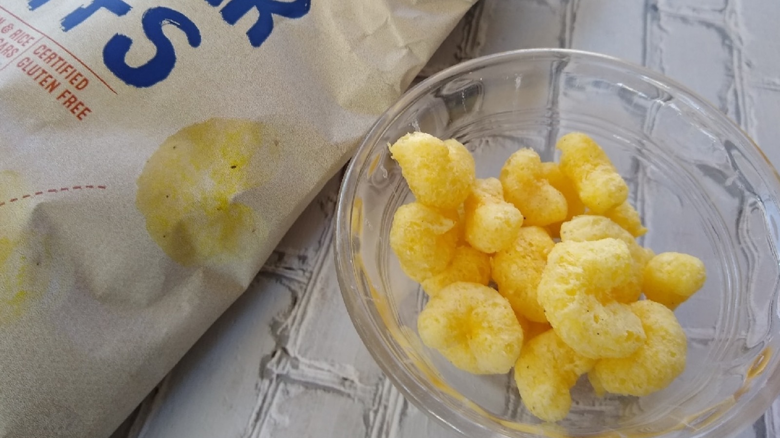 Aldi's White Cheddar Puffs Are A Deliciously Cheap Pirate's Booty Copycat