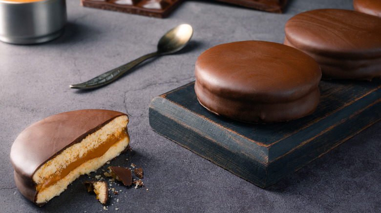 Alfajores on wooden board 