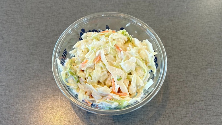 Small plastic to-go container of coleslaw from Culver's