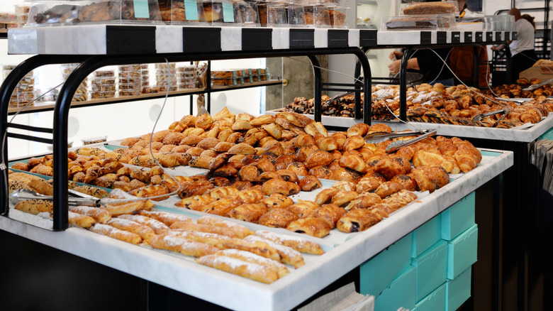 A variety of baked goods on display at a bakery