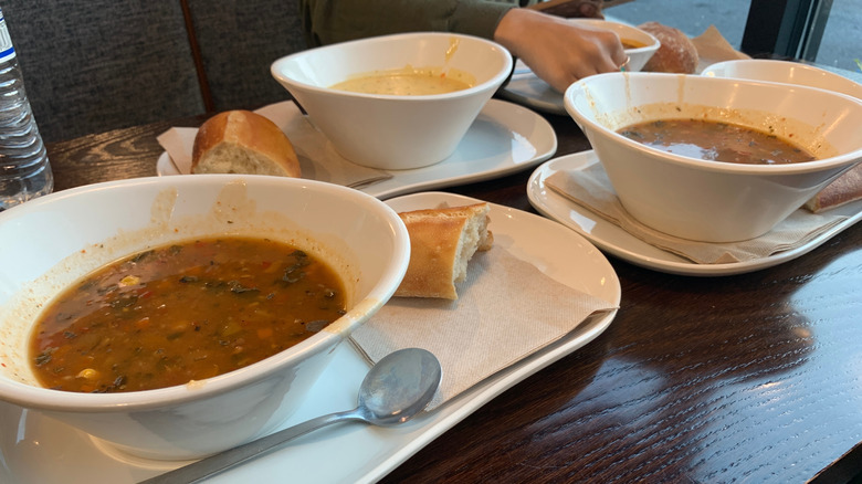 Table full of soup bowls at Panera