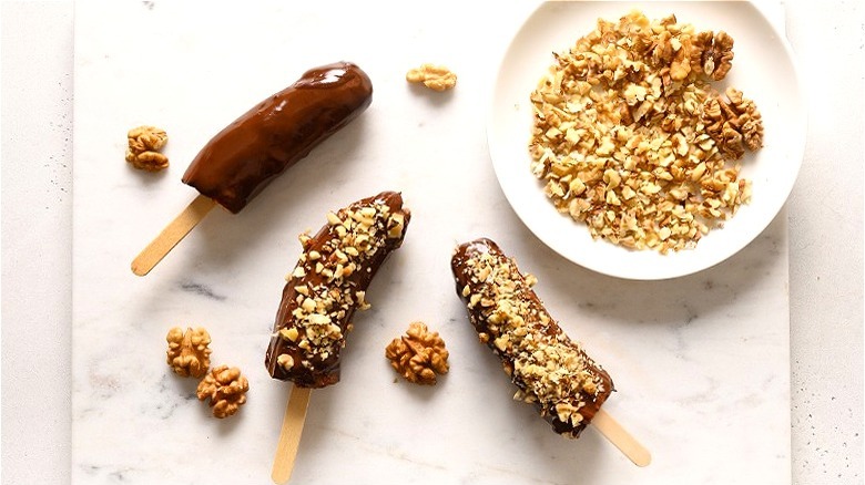 Chocolate dipped bananas with nuts