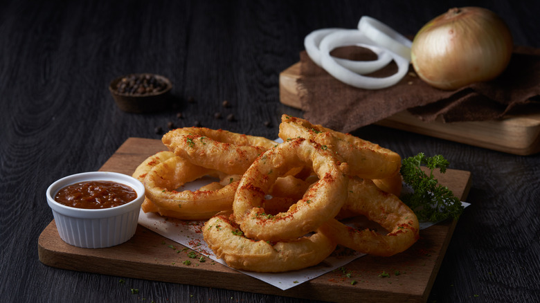 Onion rings on cutting board